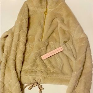 This is a pullover from kohl’s. It is a super cute item, never worn